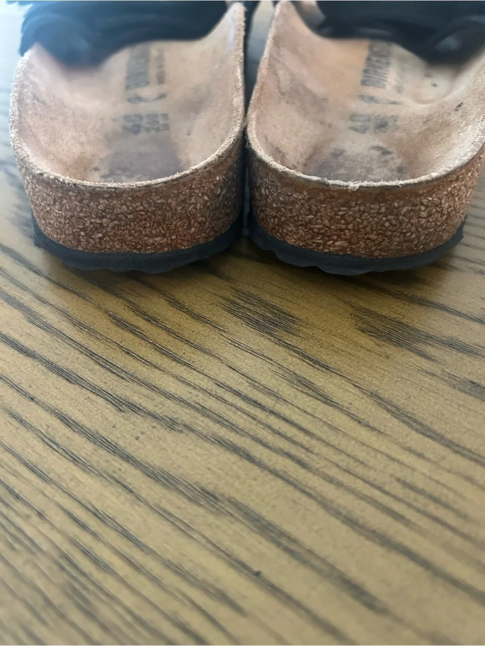 Birkenstock black slide sandals.